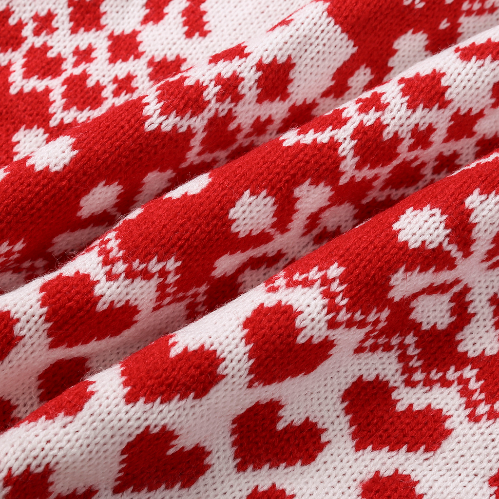 Détail de la maille et des motifs rouges et blancs