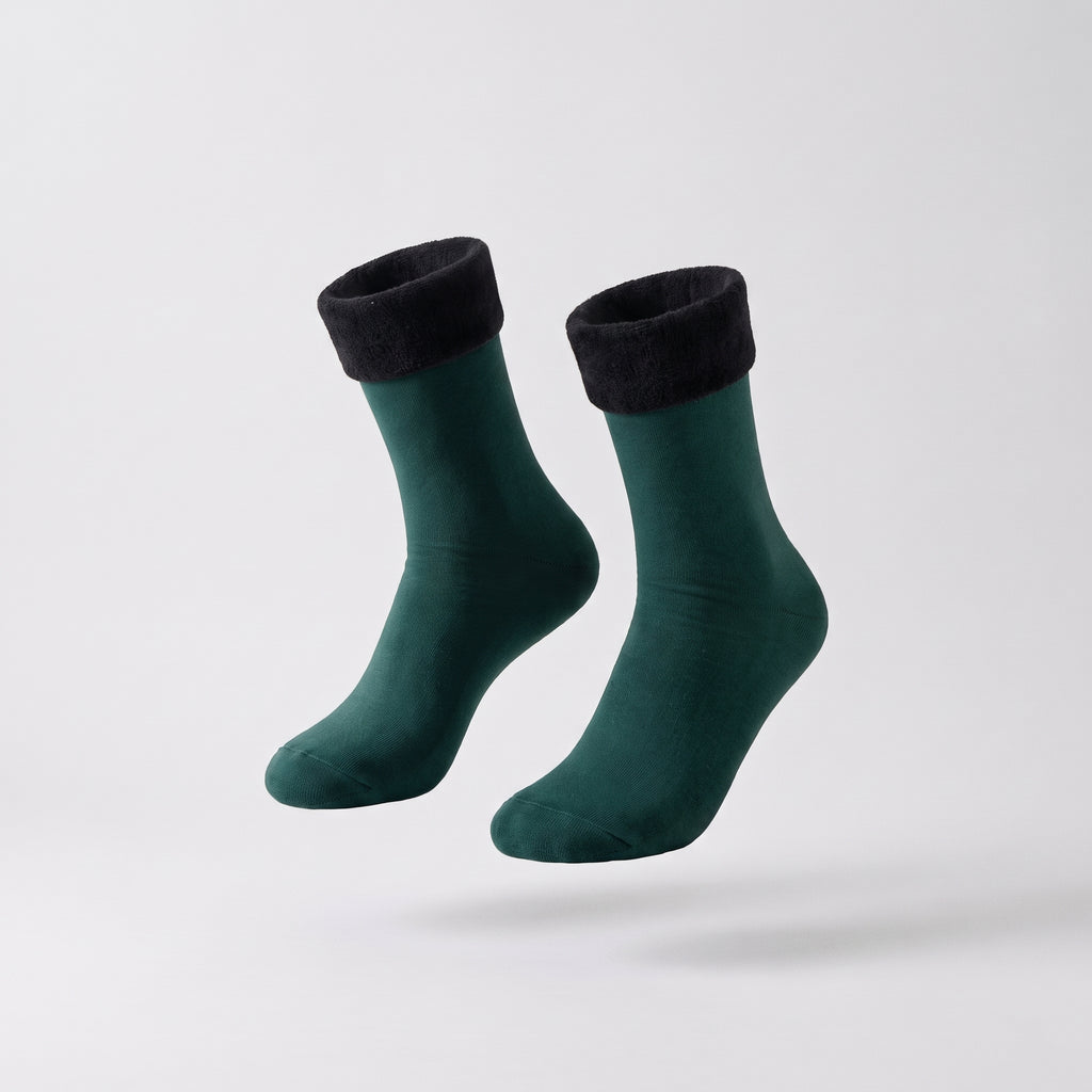 Chaussettes unies vertes à revers duveteux présentées sans pied