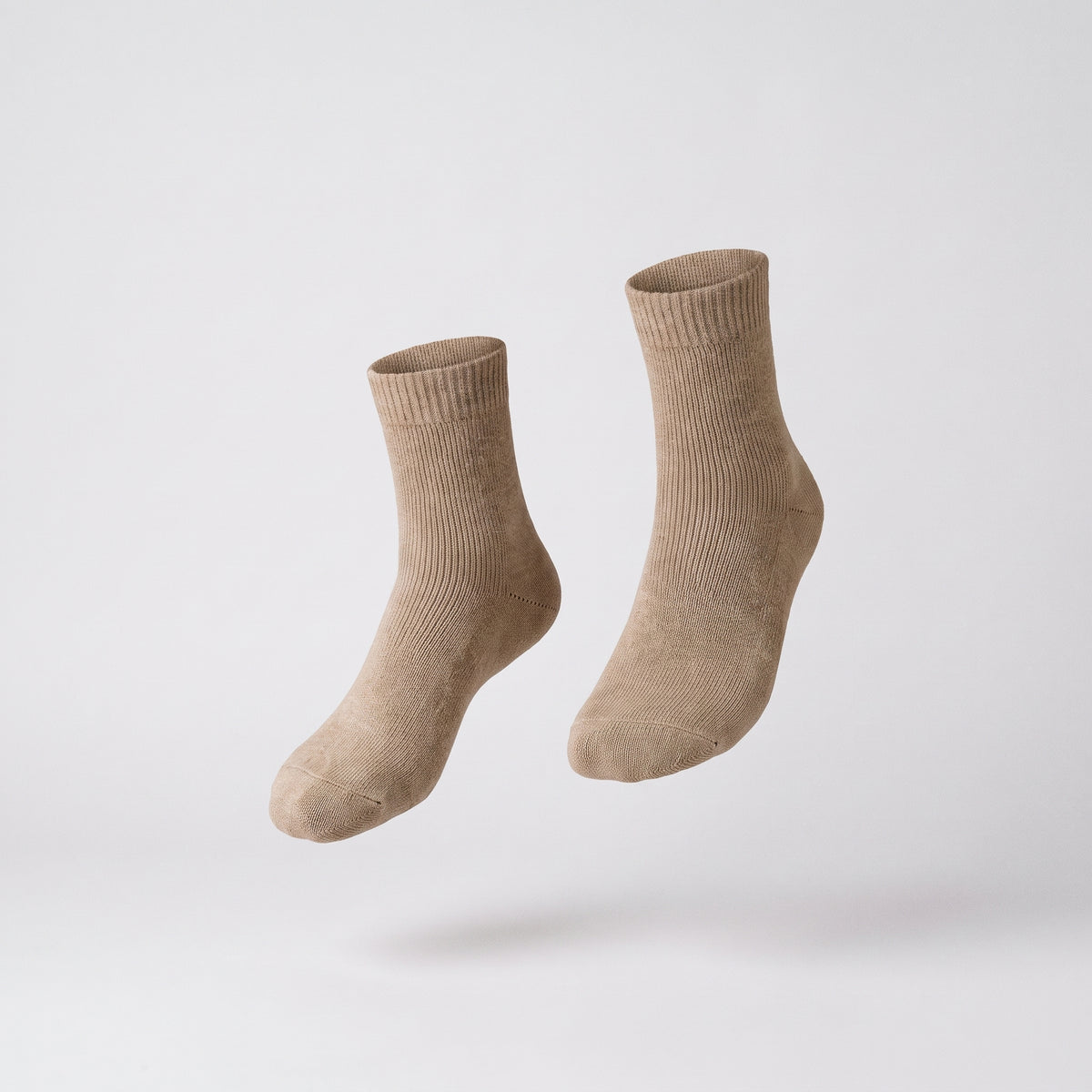 Chaussettes unies kaki présentées sans pied