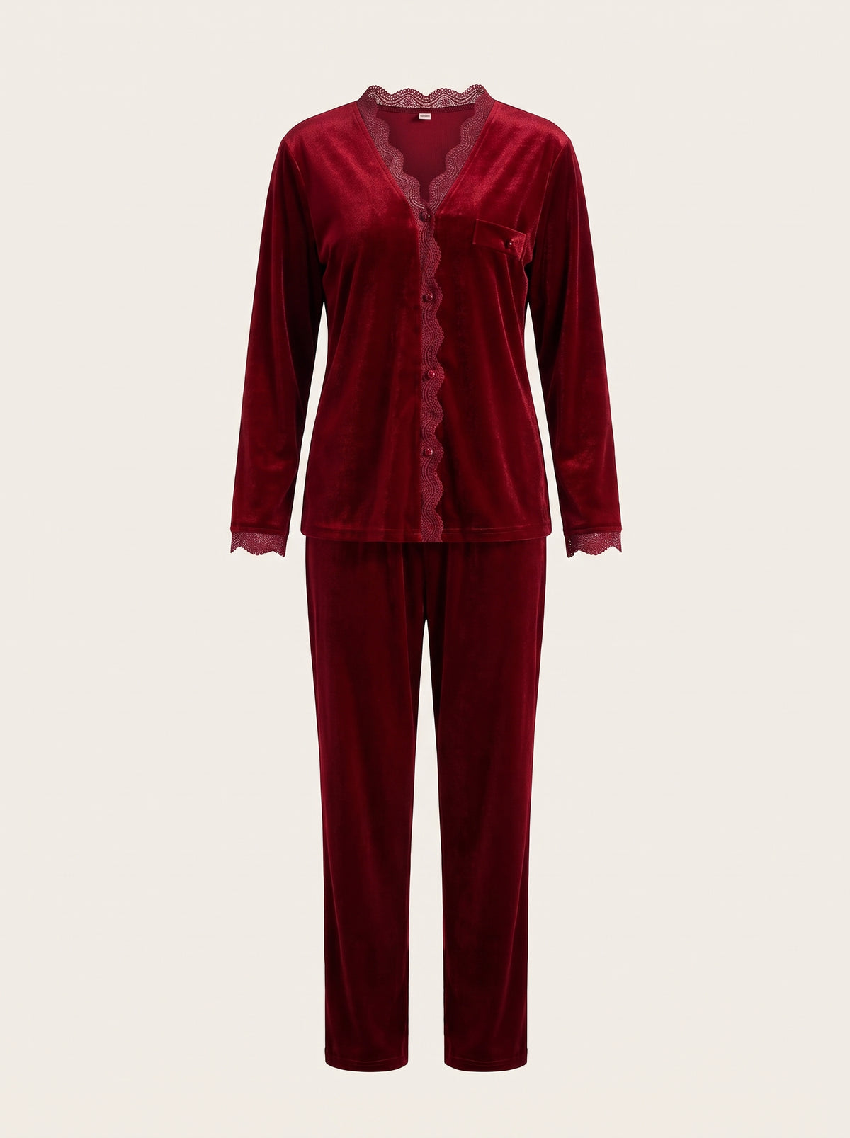 Pyjama rouge en velours, haut et pantalon sur mannequin invisible