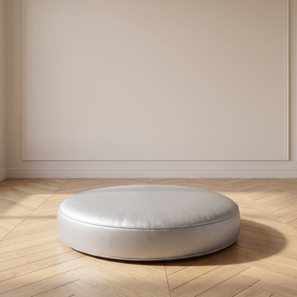 Coussin de sol rond en simili cuir gris clair