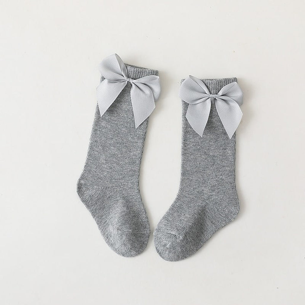 Paire de chaussettes hautes grises a grand noeud pour enfant