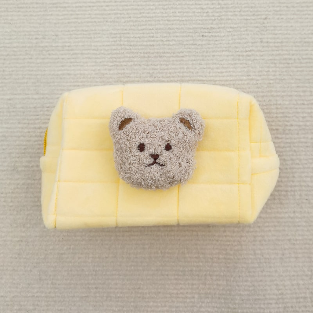 Trousse de toilette matelassée jaune