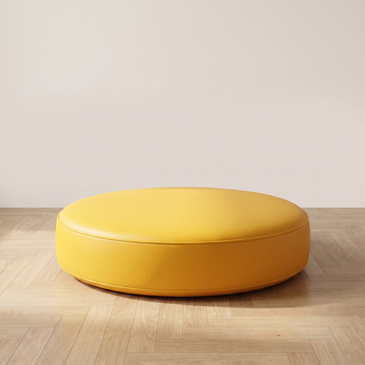 Coussin de sol rond en simili cuir jaune