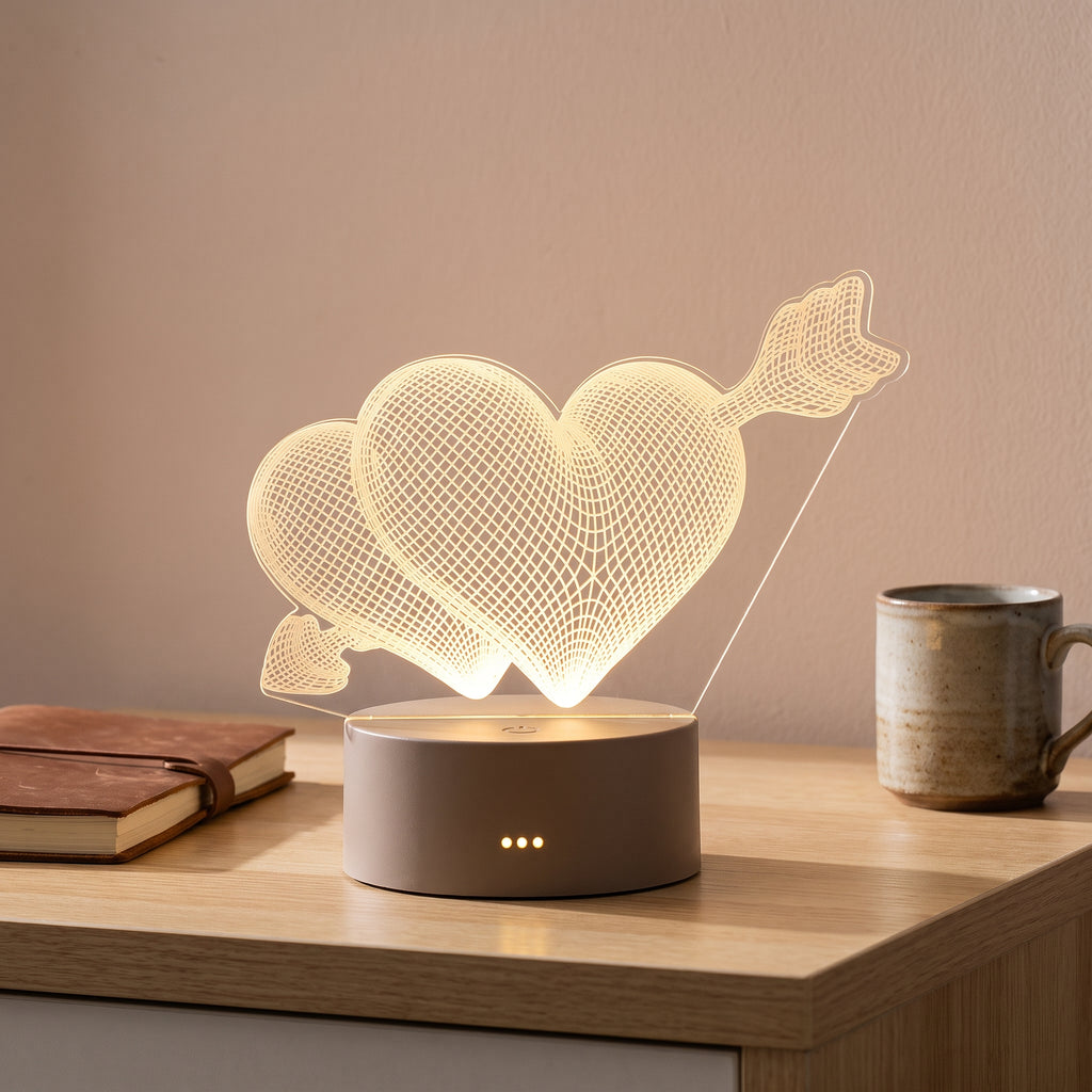 Lampe veilleuse 3D en acrylique motif cupidon dans un intérieur chaleureux