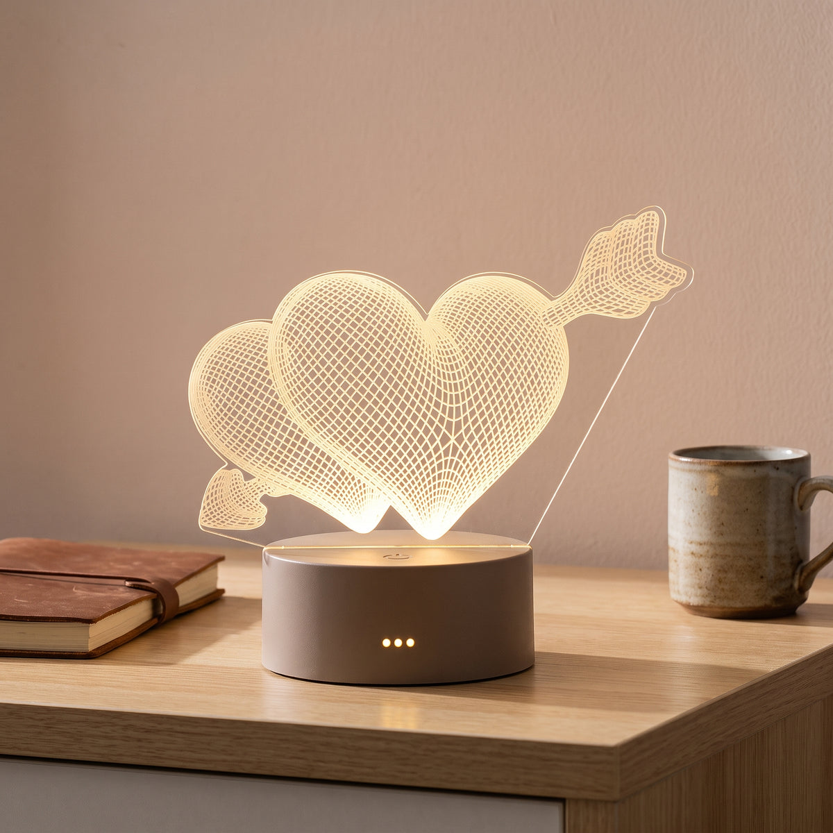Lampe veilleuse 3D en acrylique motif cupidon dans un intérieur chaleureux