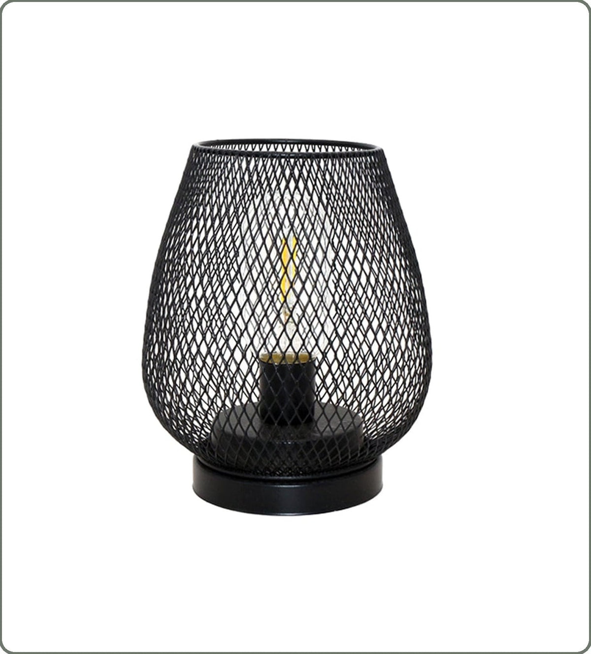 Lampe de table noire en fer ajouré sur fond clair