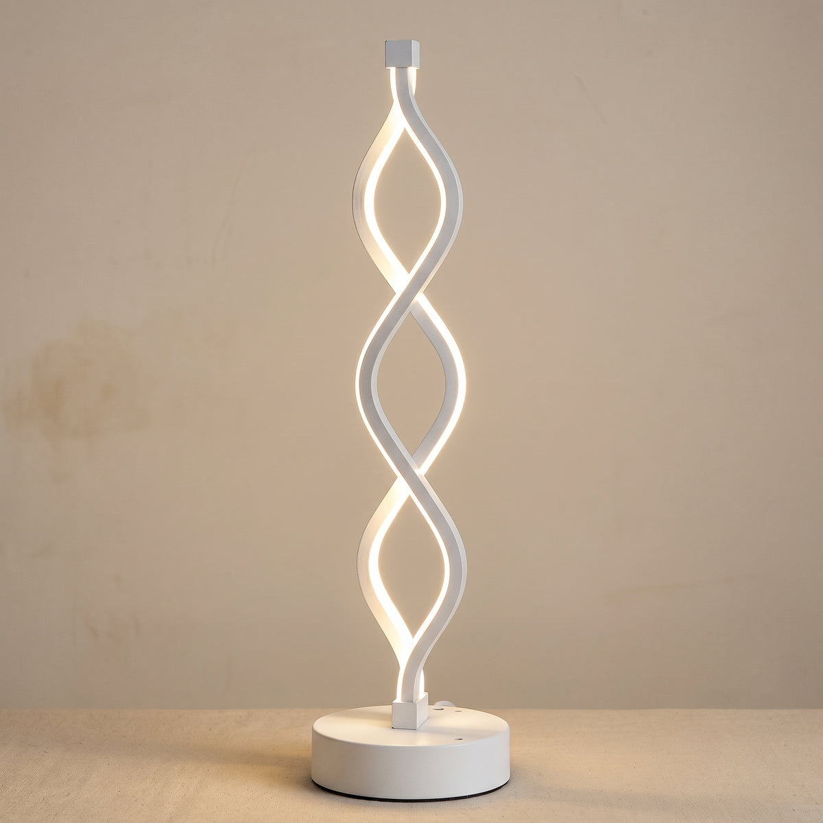 Détail du socle et des trois boucles lumineuses de la lampe spirale modèle 2