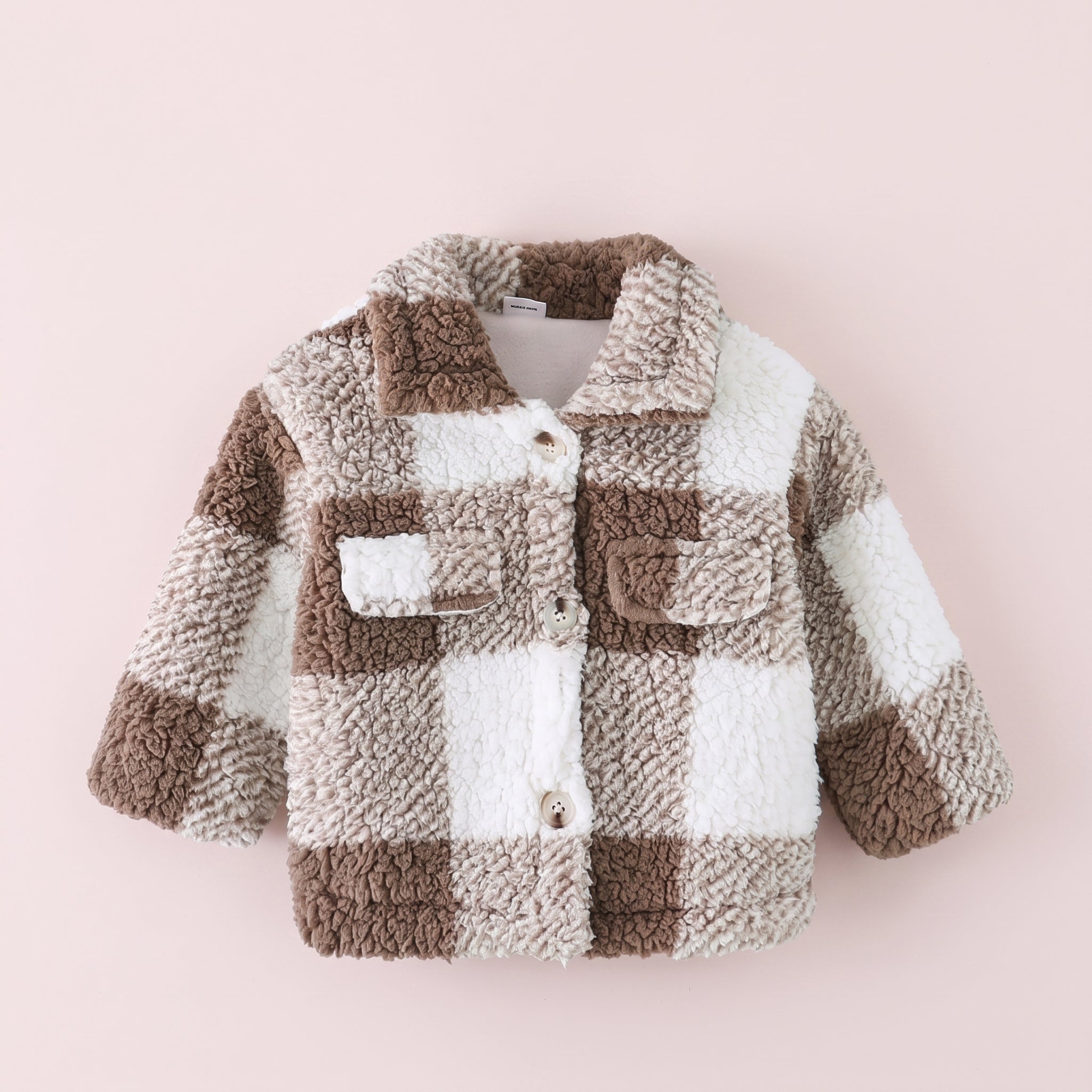 Manteau bébé à carreaux marron et écru vu de face Image