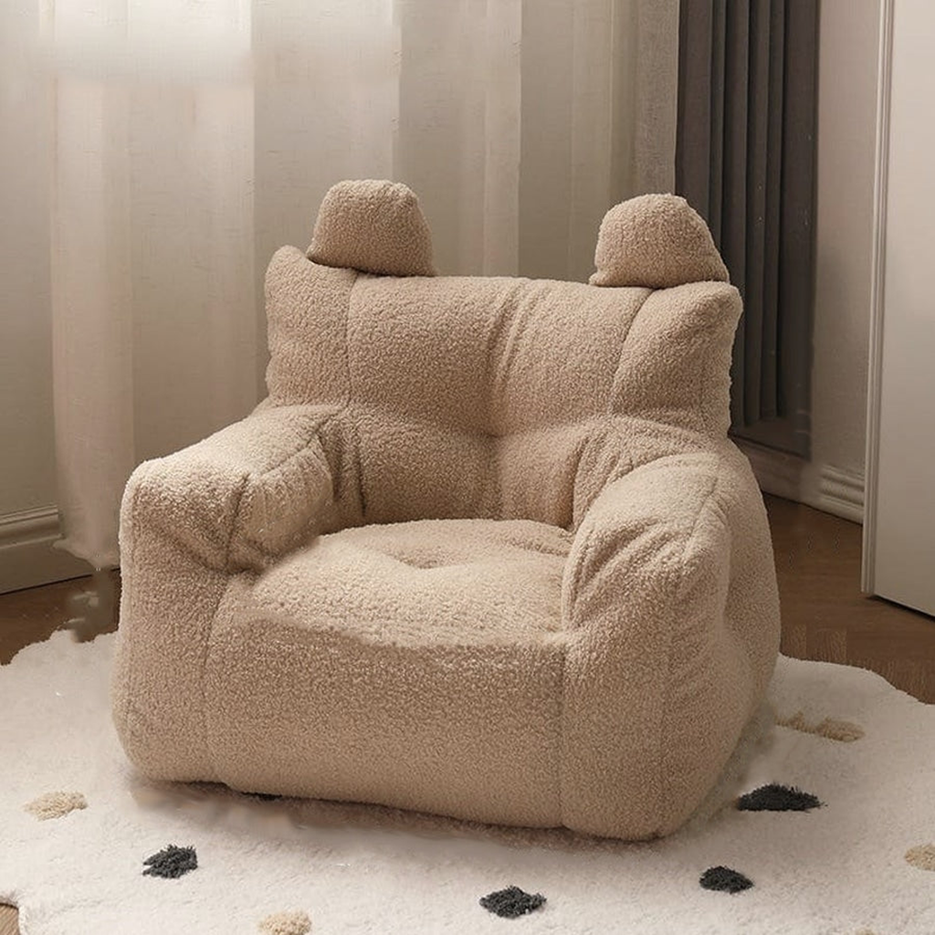 Fauteuil enfant beige en peluche avec dossier à deux oreilles et accoudoirs rembourrés