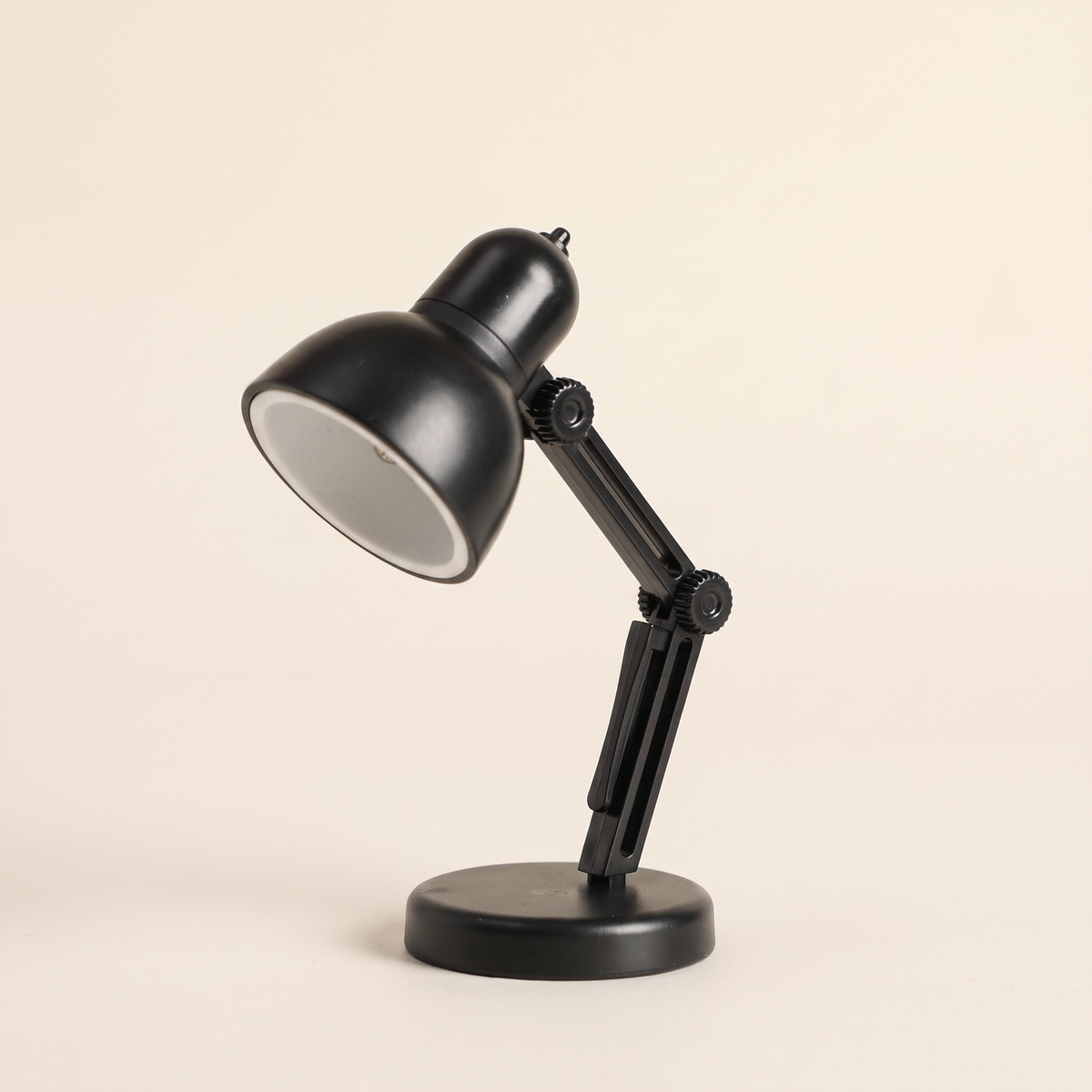 Mini lampe de lecture LED noire à abat-jour rond et bras articulé
