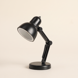 Mini lampe de lecture LED noire à abat-jour rond et bras articulé