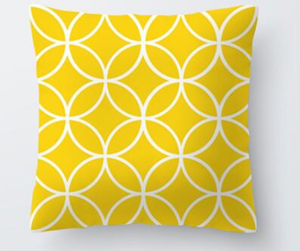 Housse de coussin jaune, motif entrelacs blancs