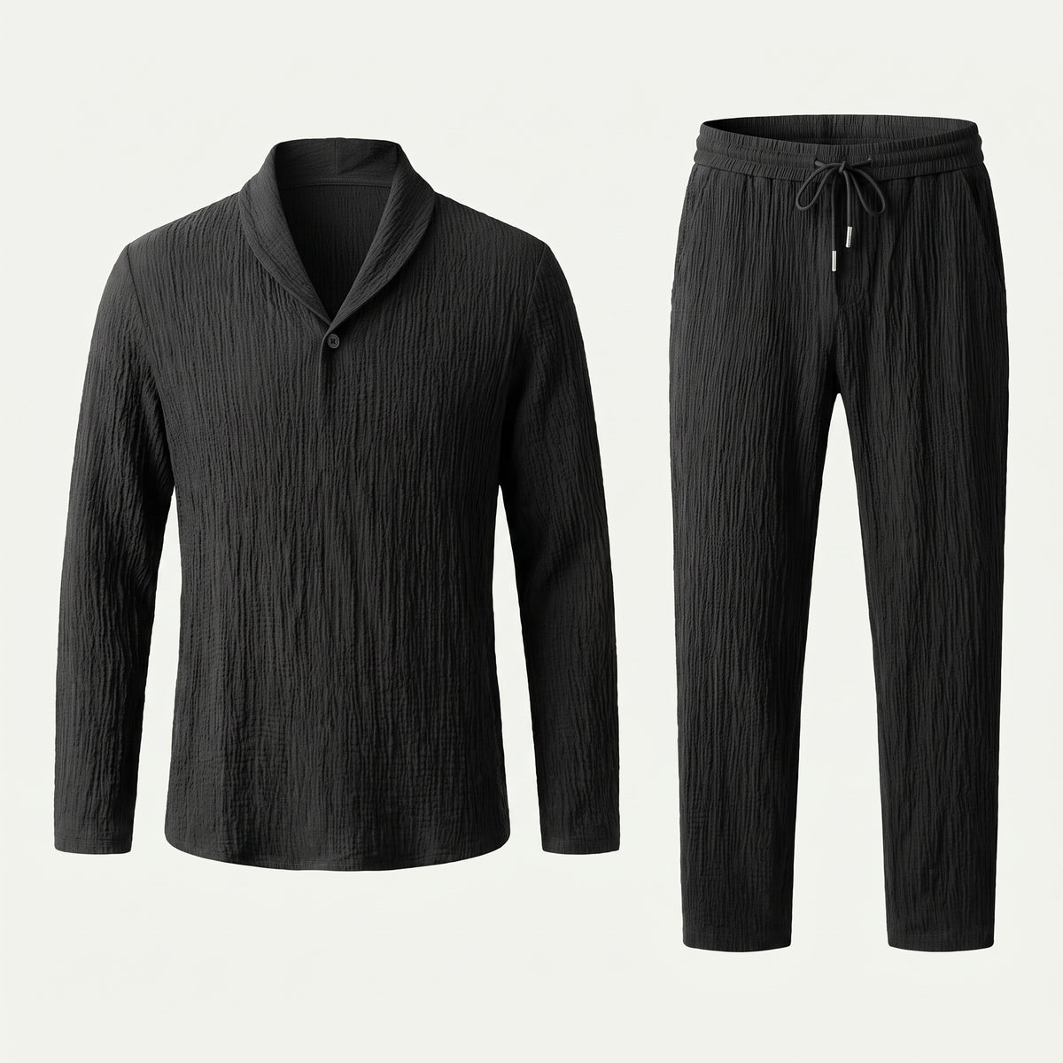 Haut et pantalon noirs texturés présentés en vue détourée