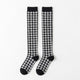 Paire de chaussettes noires à motif pied-de-poule