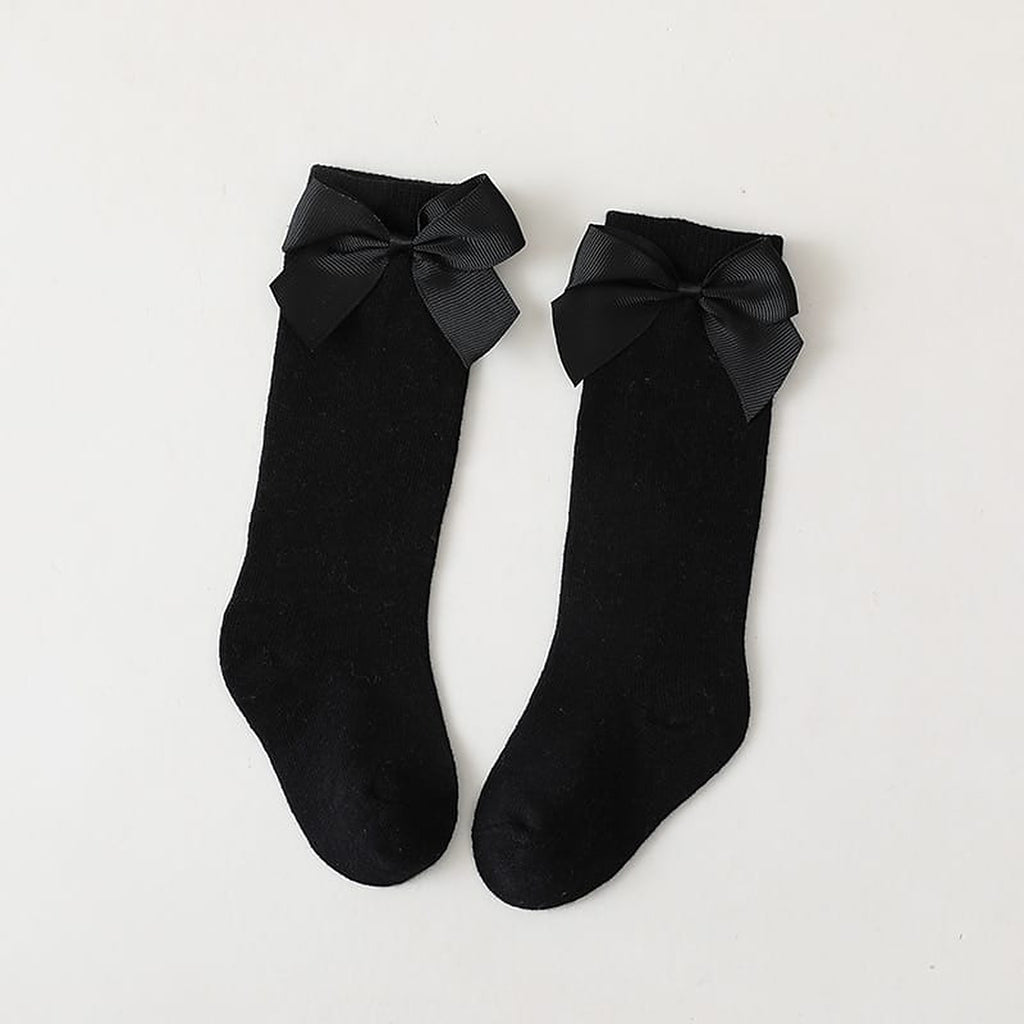 Paire de chaussettes hautes noires a grand noeud pour enfant