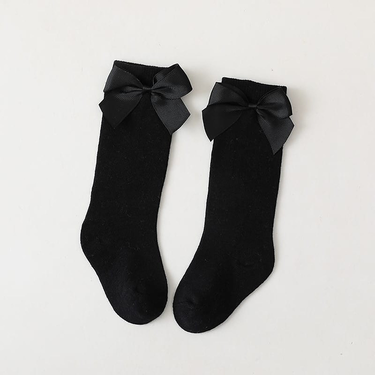 Paire de chaussettes hautes noires a grand noeud pour enfant
