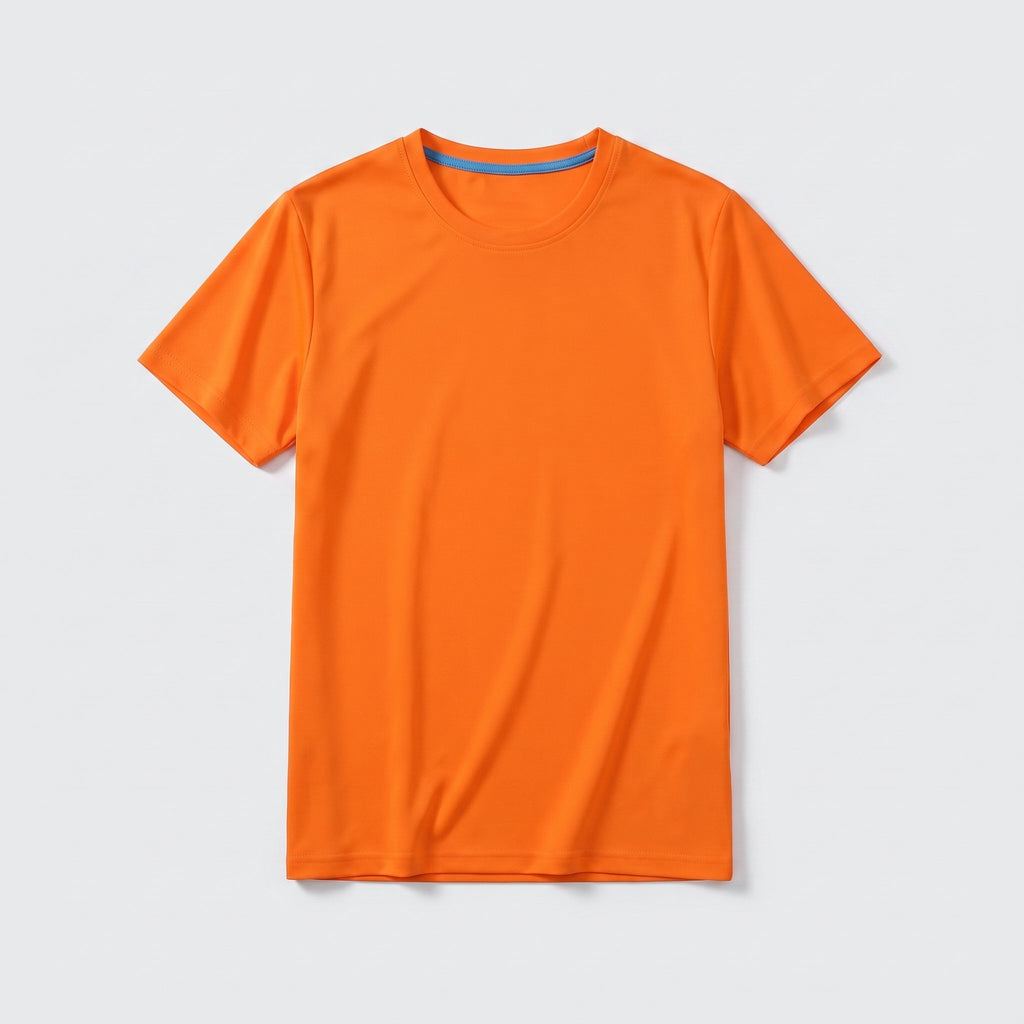 T-shirt orange en coton posé à plat, vu du dessus