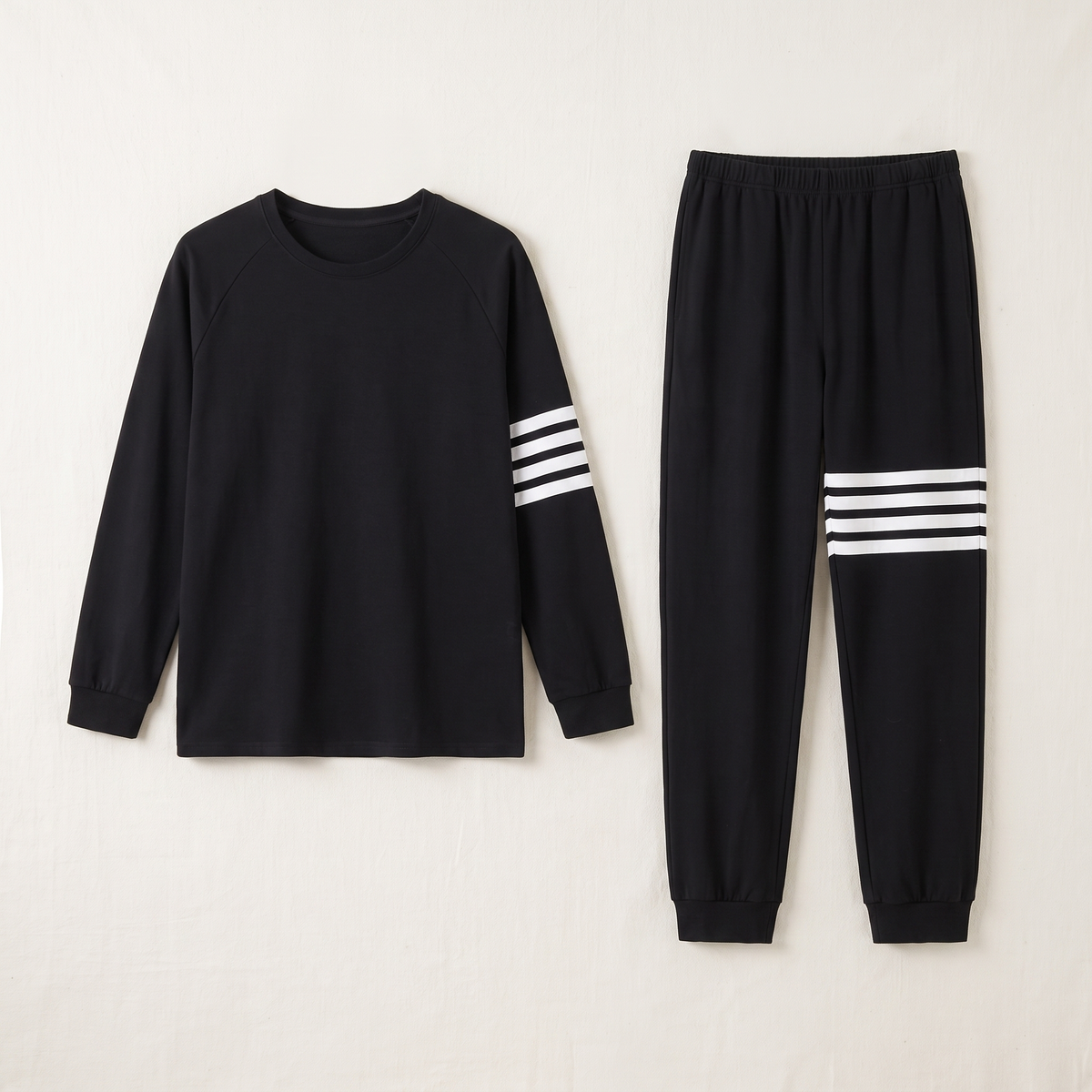 Pyjama homme noir en coton présenté de face sur fond clair