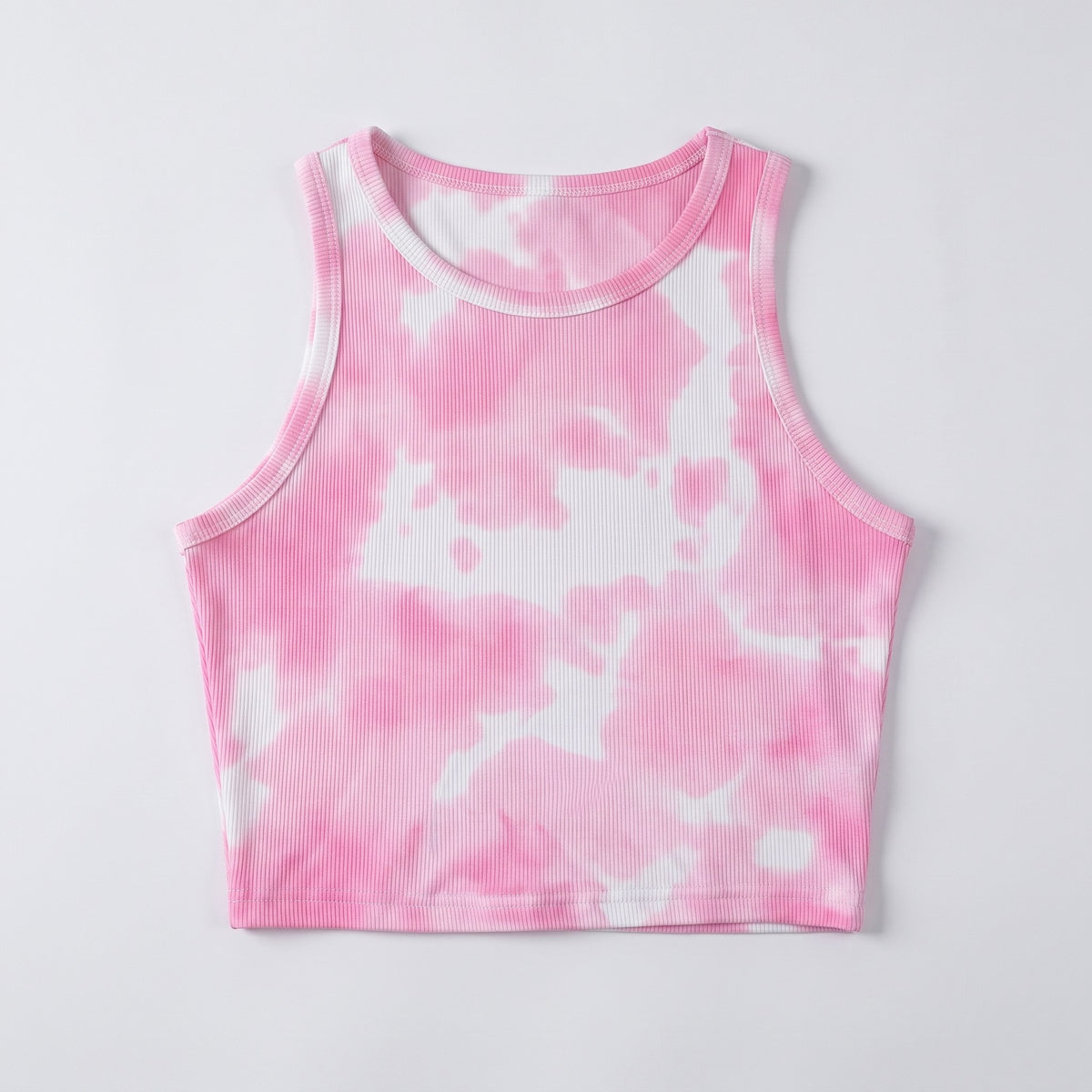 Débardeur tie and dye femme, coloris rose, posé à plat sur fond clair