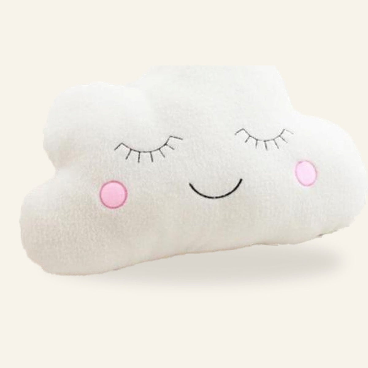 Peluche nuage blanche avec yeux fermés, sourire noir et deux pommettes roses sur fond clair