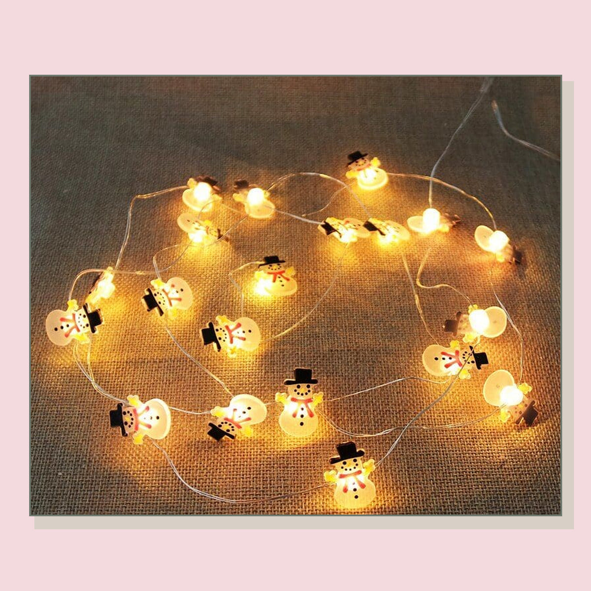 Guirlande de Noël avec les petits bonhommes de neige du modèle vendu Image