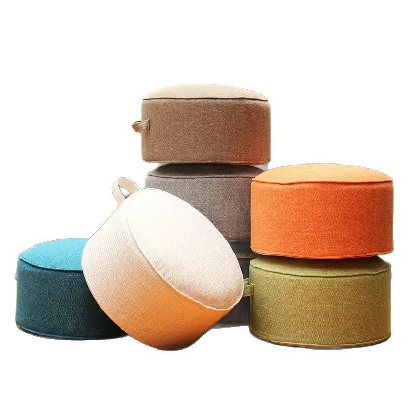 Poufs de sol en lin de 40 cm empilés dans plusieurs coloris Image