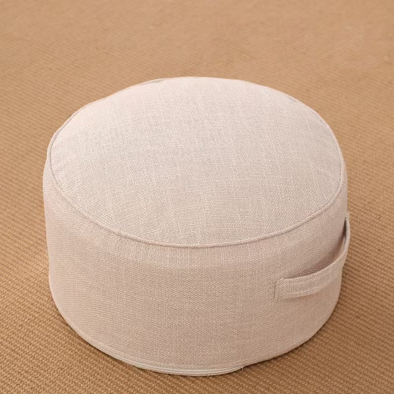 Pouf de sol rond en lin écru, diamètre 40 cm, avec poignée et passepoil