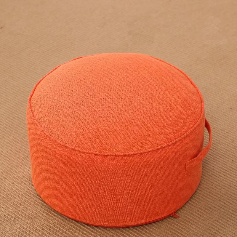 Pouf de sol rond en lin orange, diamètre 40 cm, avec poignée et passepoil