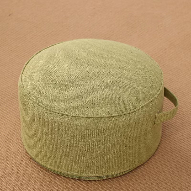 Pouf de sol rond en lin vert anis, diamètre 40 cm, avec poignée et passepoil