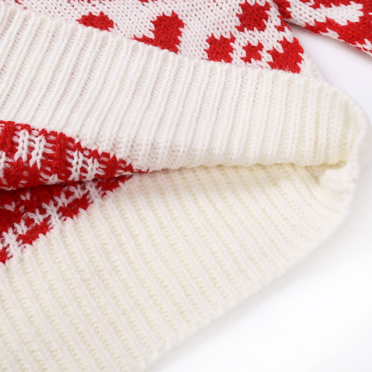 Détail de la base côtelée du pull de Noël femme Image