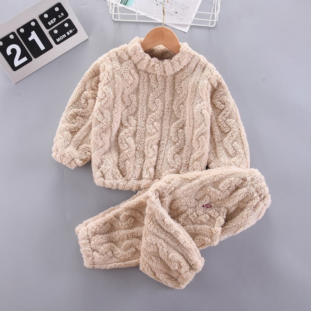 Haut et pantalon du pyjama bébé beige à torsades présentés ensemble