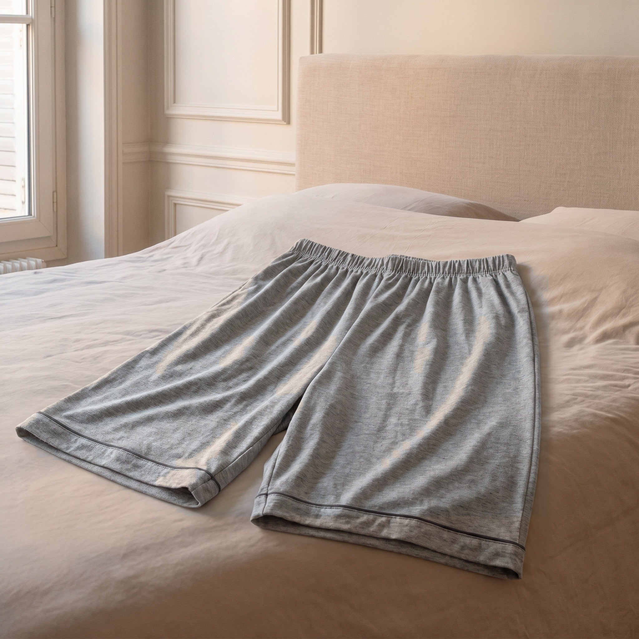 Ceinture entièrement élastiquée du short du pyjama d'été en coton gris chiné Image