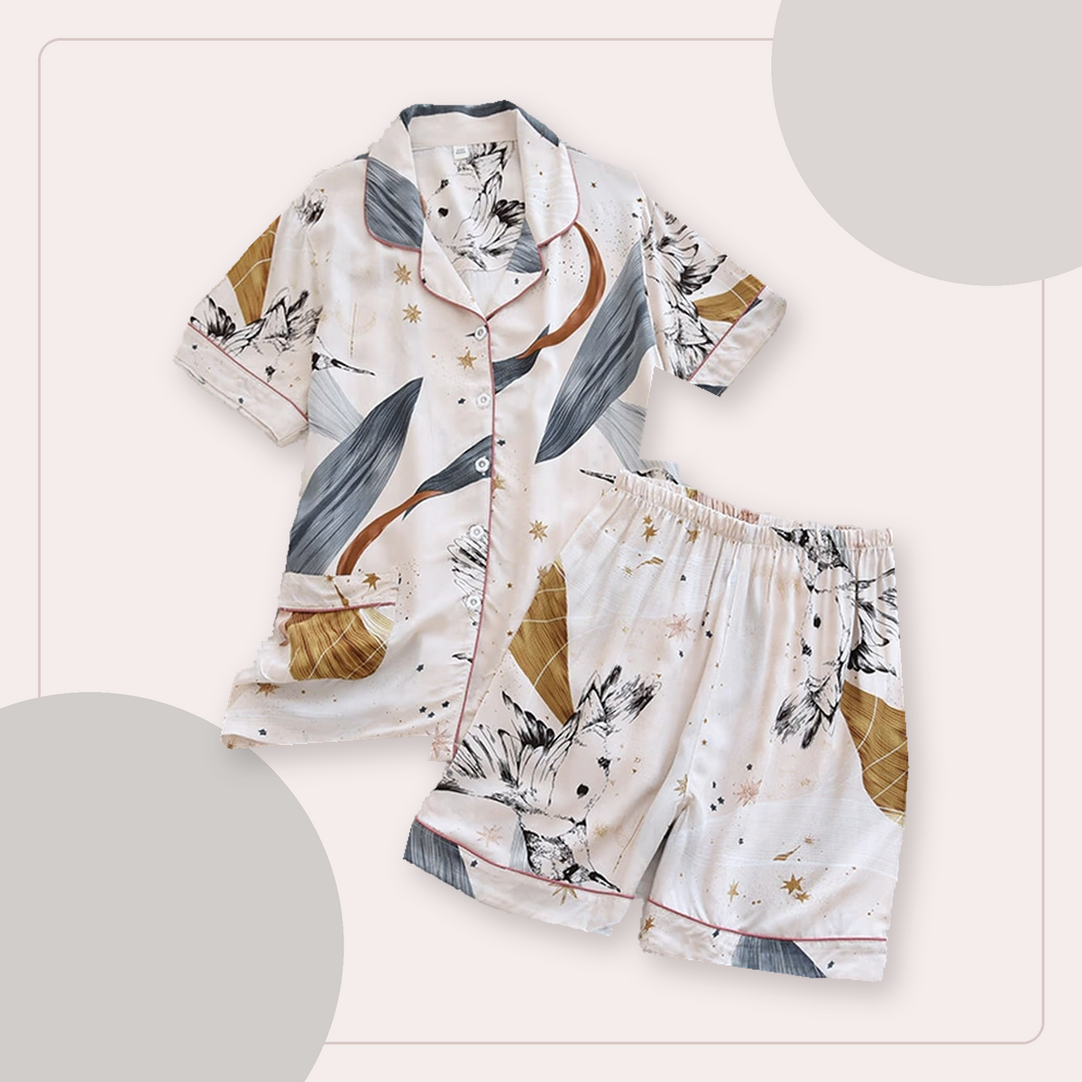 Pyjama d'été ivoire rosé à motifs de plumes et d'astres