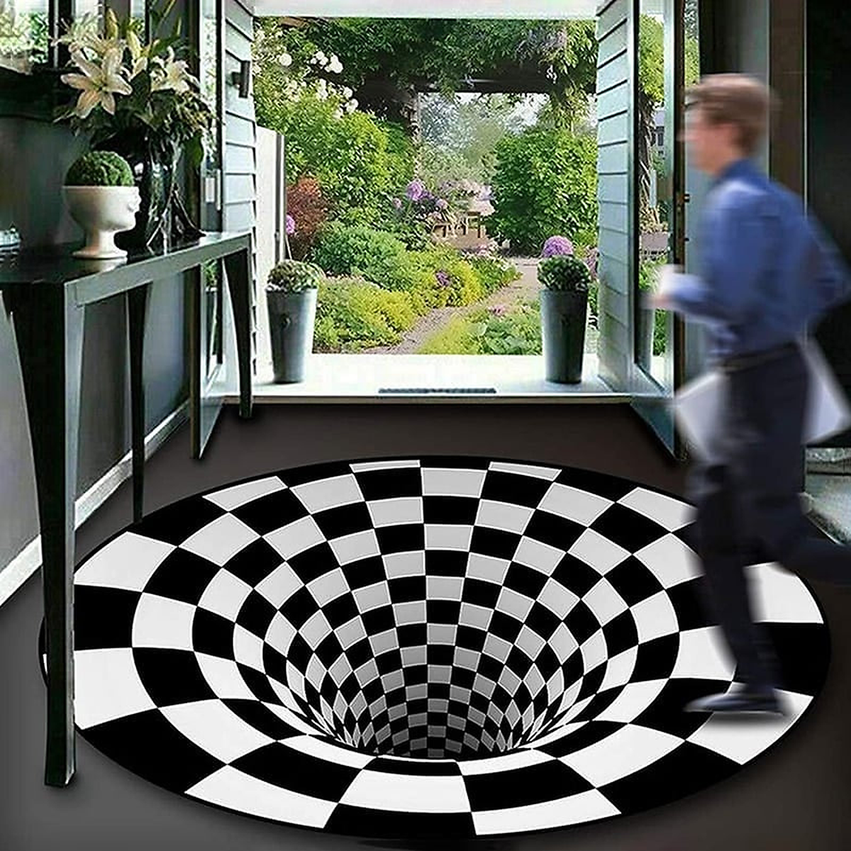 Tapis illusion d’optique rond noir et blanc dans une entrée