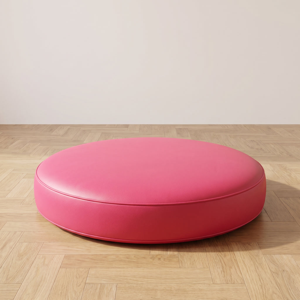 Coussin de sol rond en simili cuir rose fuschia