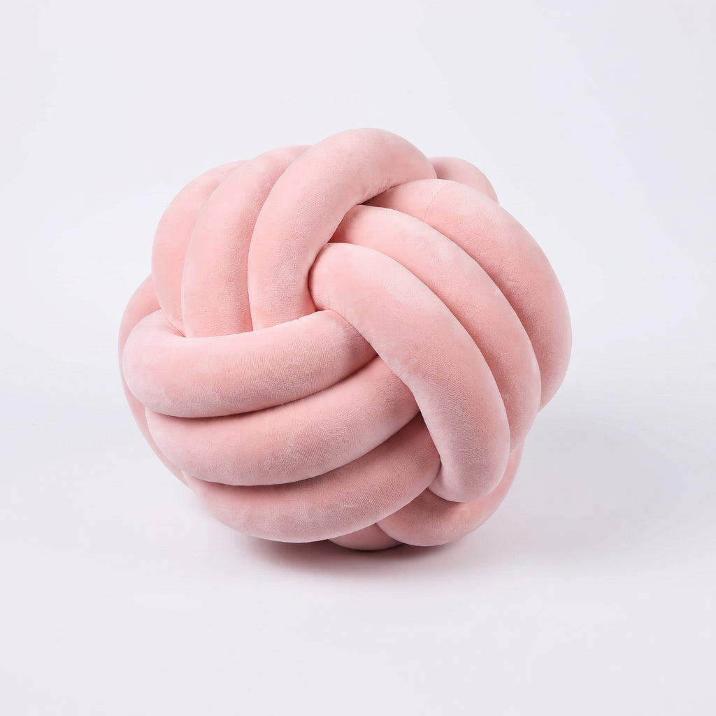 Coussin nœud en velours rose intense, boule tressée de 20 cm