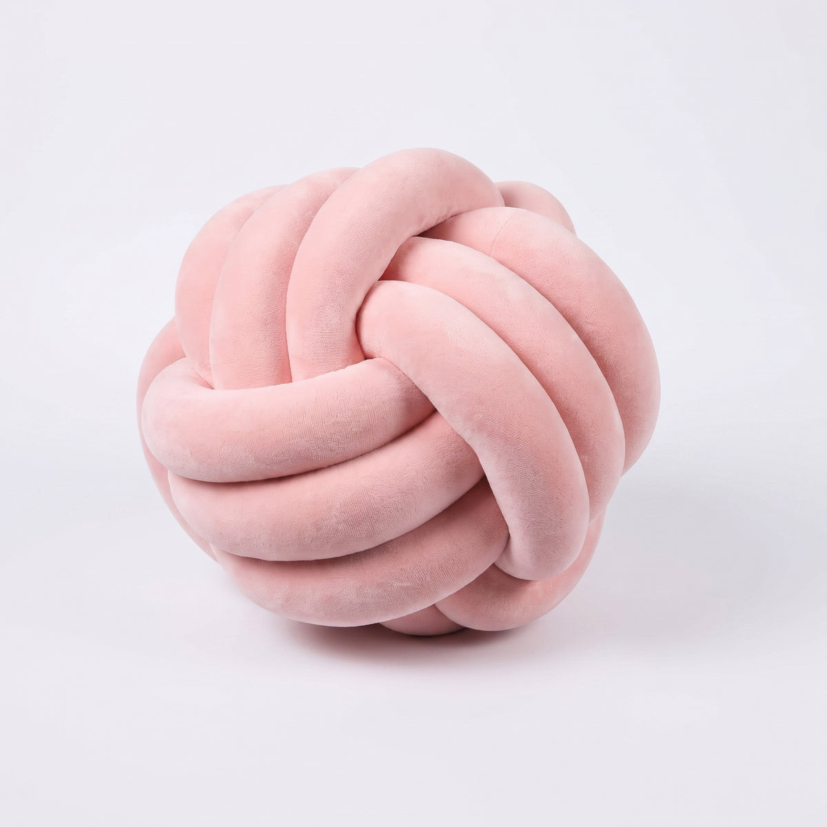 Coussin nœud en velours rose intense, boule tressée de 20 cm