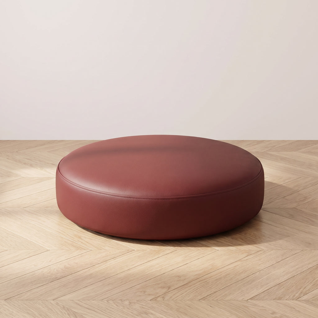 Coussin de sol rond en simili cuir rouge foncé