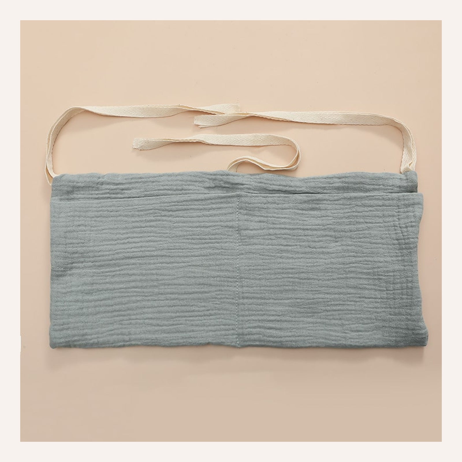 Sac de rangement gris à deux poches avec trois liens écrus Image