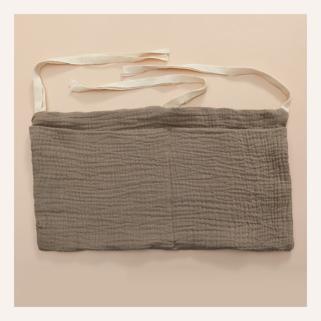 Sac de rangement pour lit bébé marron avec trois liens écrus