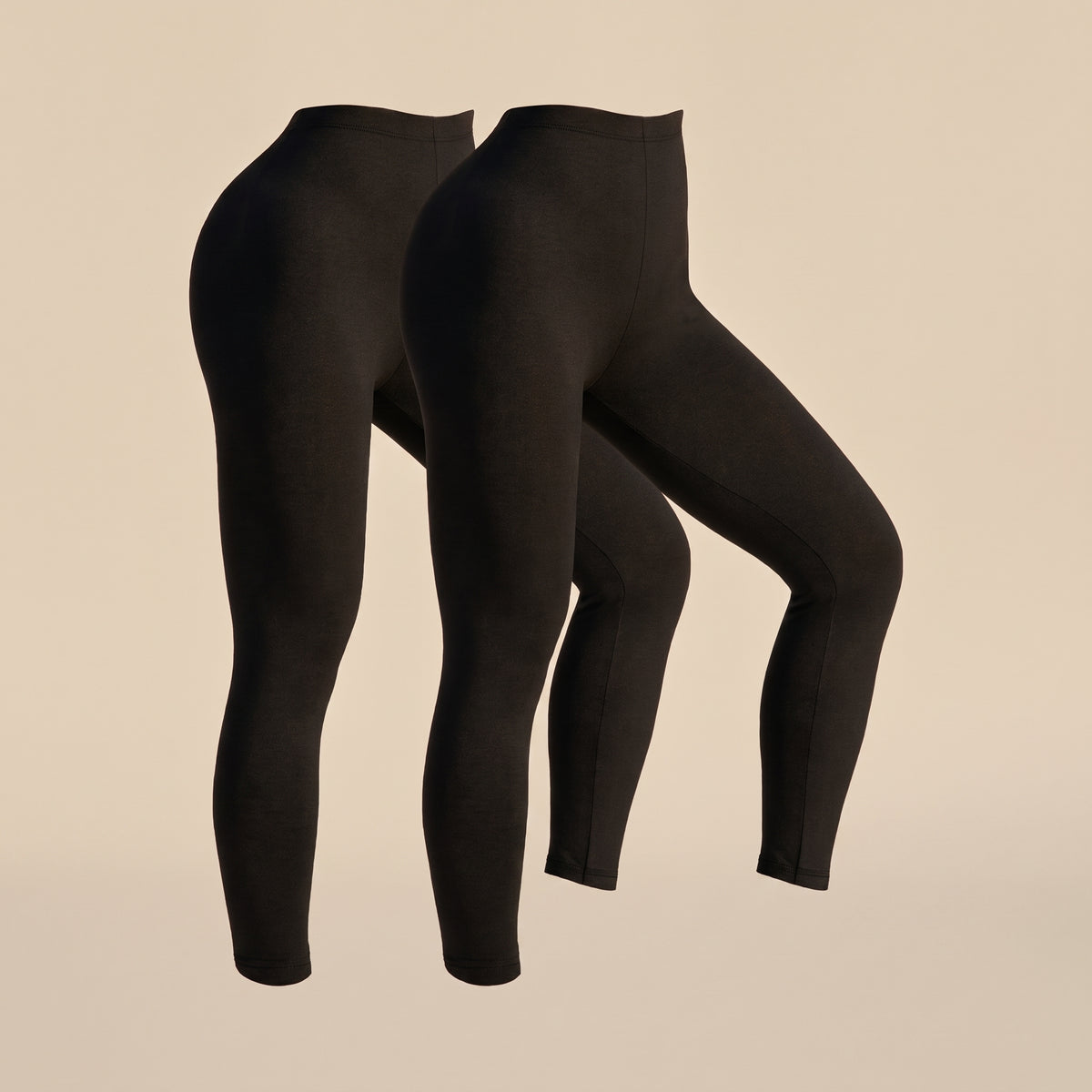 Legging noir extensible présenté seul sur fond uni