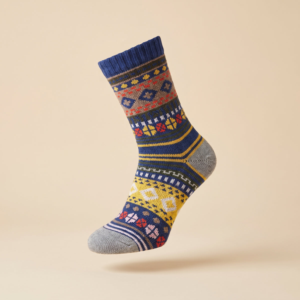 Chaussette chaude à motifs présentée en volume, forme du pied visible