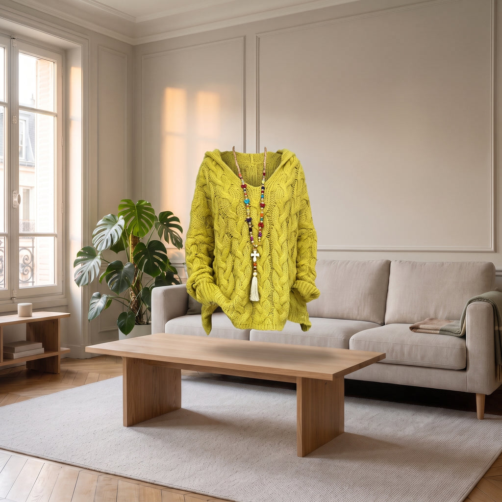 Pull en grosse maille jaune sans corps, montrant la coupe