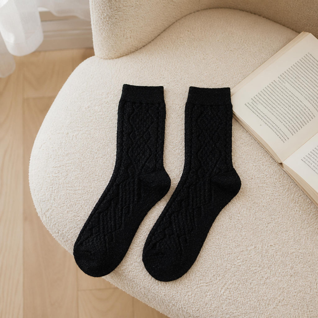 Chaussettes noires en maille torsadée vue de face