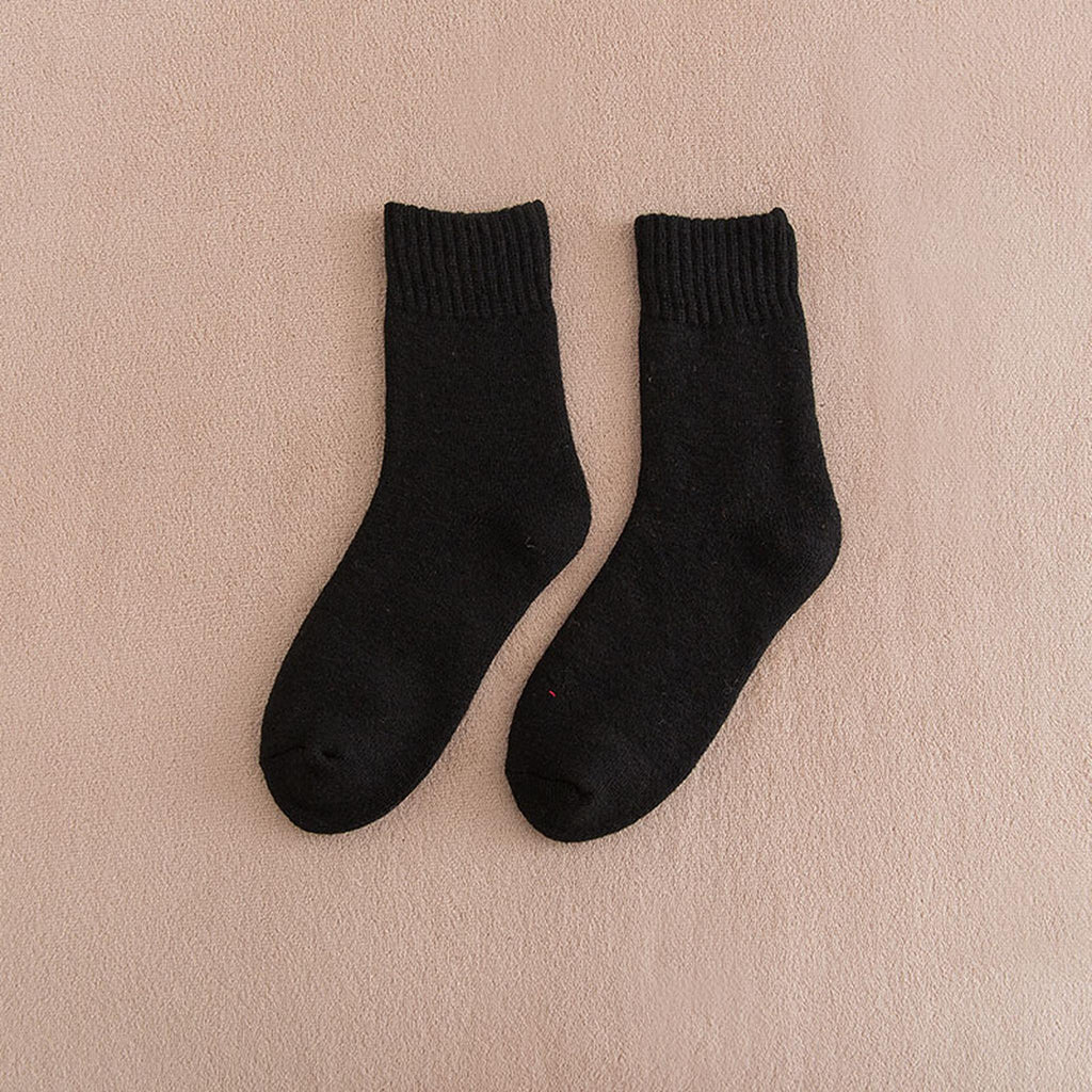 Chaussettes en laine épaisse noires à plat