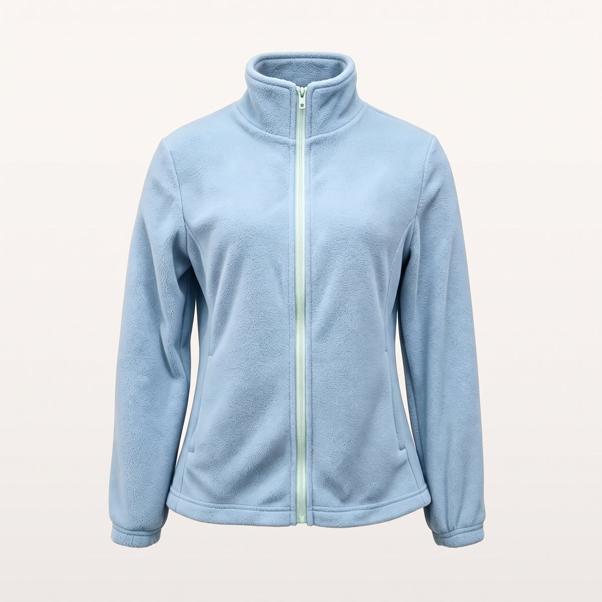 Veste polaire femme bleu ciel à col montant sur fond uni