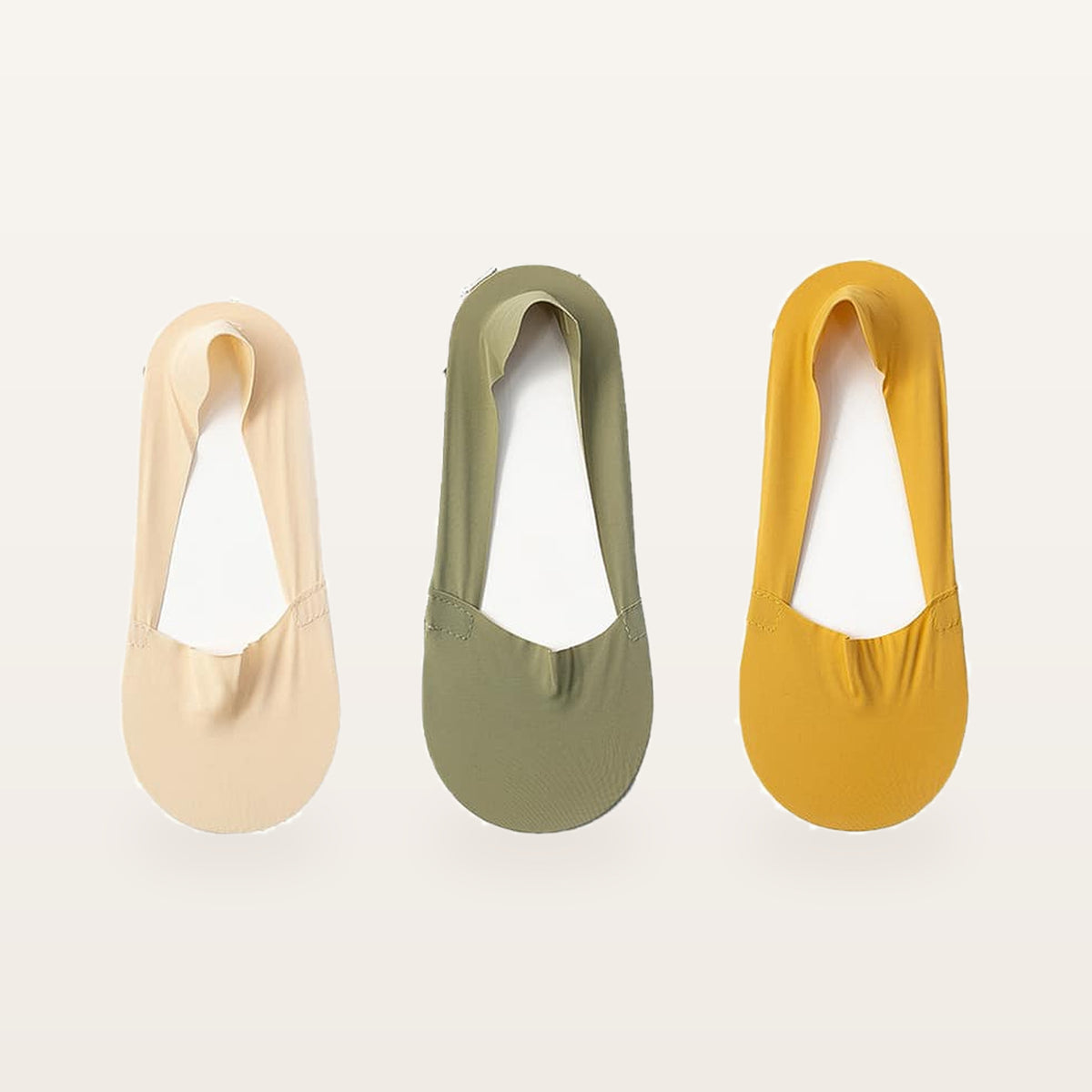 Assortiment de trois paires de socquettes invisibles : beige nu, vert kaki et jaune moutarde