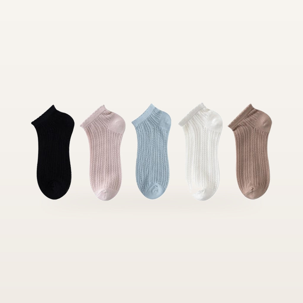 Assortiment de cinq paires de socquettes en maille ajourée : noir, rose poudré, bleu ciel, blanc et brun