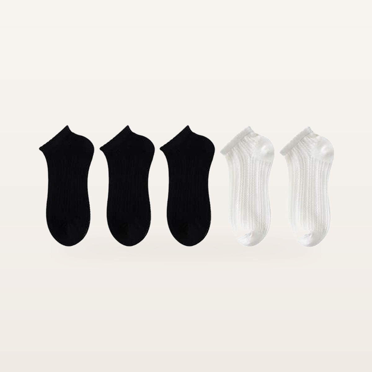 Assortiment de cinq paires de socquettes en maille ajourée : trois paires noires et deux écrues